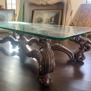 Coffee table with carving.